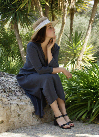 SANTA MONICA DRESS • Crushed cotton maxi dress in a loose fit featuring a bib front with mock collar and low v-neck, three quarter length sleeves and button close cuffs.